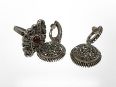 A silver marcasite ring and pair of earrings