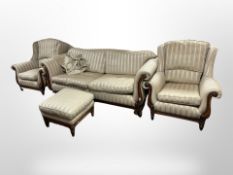 A four piece Victorian style lounge suite comprising of three seater settee,
