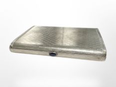 A silver visiting card case with sapphire clasp
