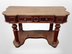 A Victorian mahogany side table fitted a drawer,