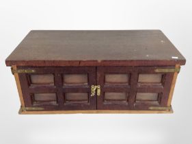 A coin collector's cabinet and contents to include British predecimal coins, crowns, etc.