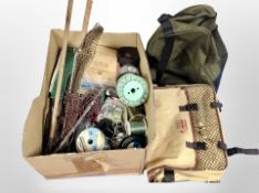 Two boxes of fishing equipment, bags, nets, spools of line,