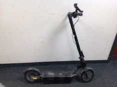 An electric scooter (as found) CONDITION REPORT: no key, no charger,