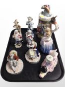 A group of continental porcelain ceramics including a Capodimonte stein, two pairs of bookends,