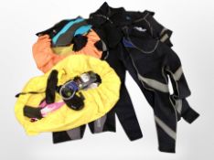 Two boxes containing wet suits and diving equipment.