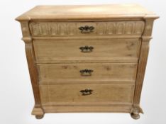 A 19th century Danish oak four drawer chest,