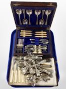 An oak canteen and one further cutlery case containing assorted plated flatware