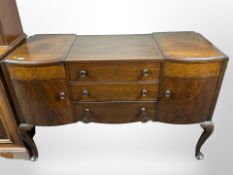 A Queen Anne style walnut bow fronted sideboard,