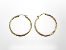 A pair of 9ct gold hoop earrings, diameter 29mm.