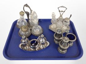 Four silver-plated cruet sets.