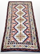 An Eastern woolen rug,