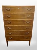 A 20th century Danish teak six drawer chest,