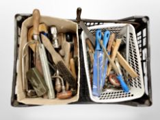 A crate containing assorted vintage hand tools.