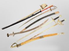 A group of Indian style swords,