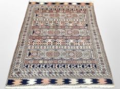 An Afghan Kilim rug, of geometric design,