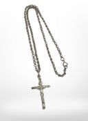 A silver chain with crucifix pendant