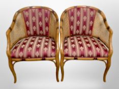 A pair of bergere armchairs,