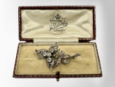 An impressive platinum diamond bar brooch modelled as a flower bud, approximately 2ct.