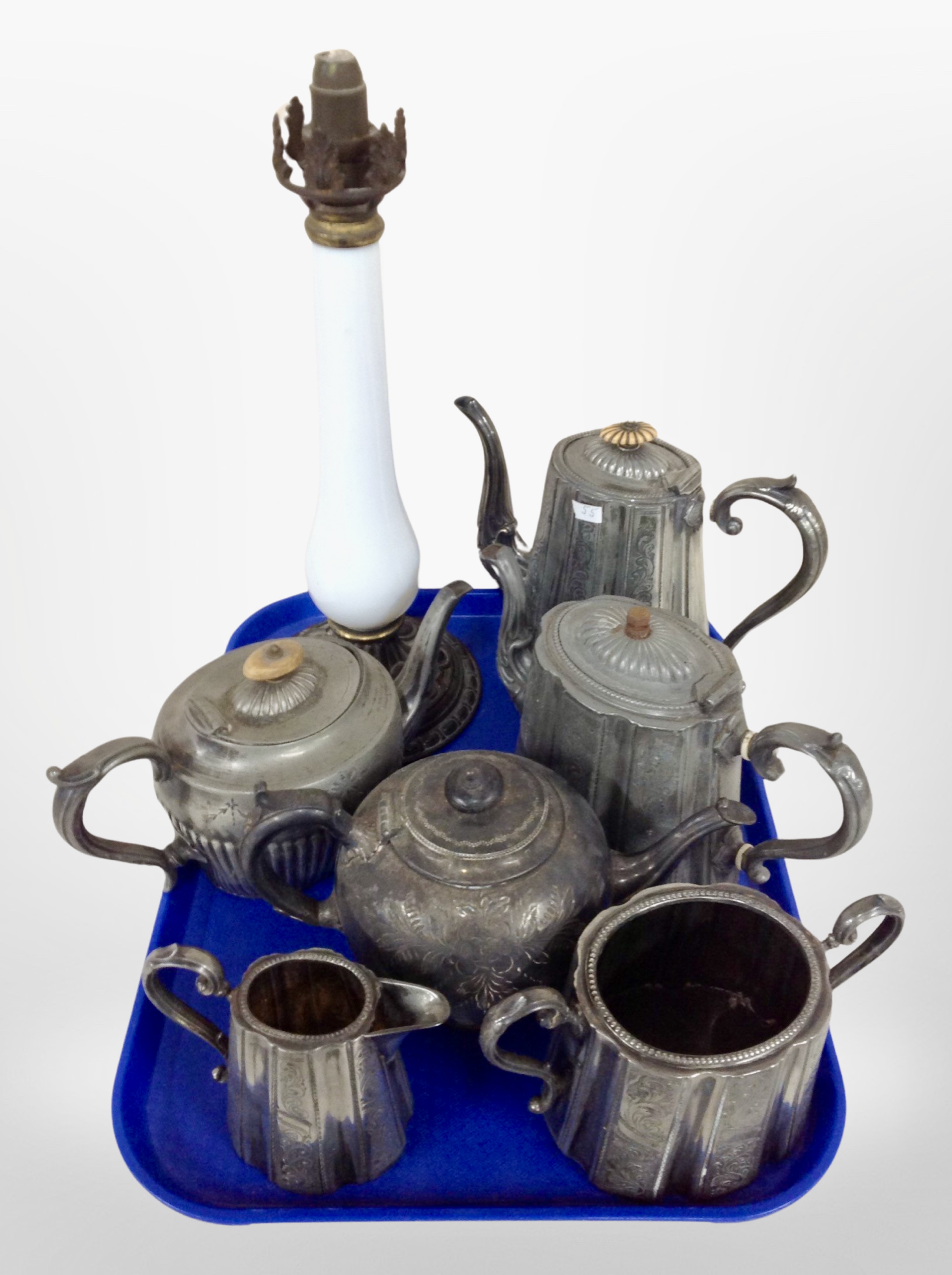 A group of silver-plated tea wares, lamp base.