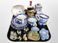 A tray of ceramics including Ringtons blue and white teacups and saucers,