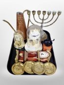 A brass menorah, copper and brass coffee pot, Hermle clock under dome and one other,