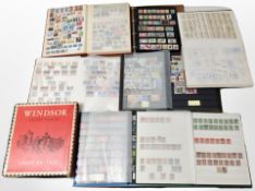 Eight stamp ablums containing world stamps, machine labelled postage stamps,