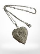 A silver locket on chain