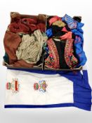 Two boxes containing vintage clothing, dresses, decorative sequined waistcoats, etc.