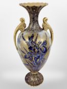 A Carlton Ware blue and gilt twin-handled vase,