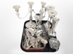 A group of silver plated wares, two table candelabra, pair of candlesticks, vase,