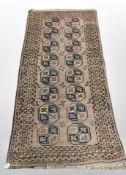 A Bokhara rug, Afghanistan, 196cm by 96cm.