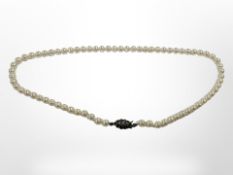 A cultured pearl necklace on silver clasp