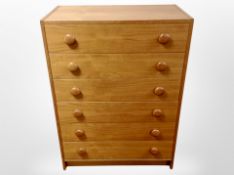 A 20th century Danish teak effect chest of six drawers,