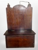 A mahogany candle box, height 38cm.
