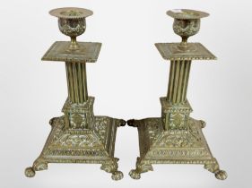 A pair of Victorian brass candlesticks, height 21cm.