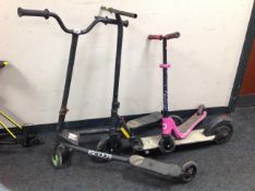Three child's scooters