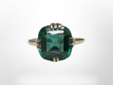 A 15ct yellow gold set with a synthetic green stone.