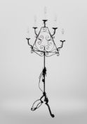 A contemporary wrought iron five sconce lamp,