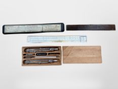 An A W Faber draughtsman's rule in box together with a precision drawing set and a 19th century