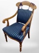 An early 20th century Scandinavian beech framed armchair