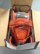 A Flymo electric garden mower in box together one other mower (2)