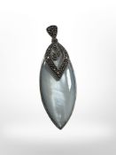 A silver marcasite mounted pendant