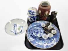 A group of oriental ceramics including Japanese Satsuma vase, Japanese sake case set,