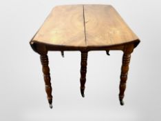 A 19th century mahogany drop leaf dining table and four dining chairs