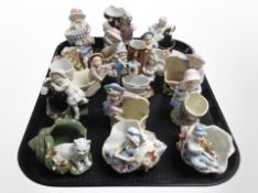 A group of Bavarian porcelain figurines and spill vases.