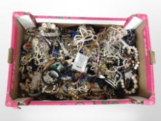 A box containing a large quantity of costume jewellery, faux pearls, bead necklaces, bangles, etc.