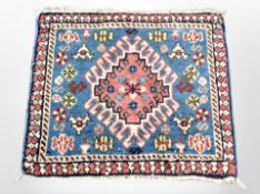 A small Iranian hearth rug,