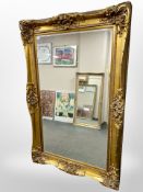 A 19th century-style bevelled overmantel mirror, 123cm x 184cm.