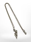 A silver pendant and chain