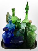 A group of 20th century coloured glass decanters and stoppers